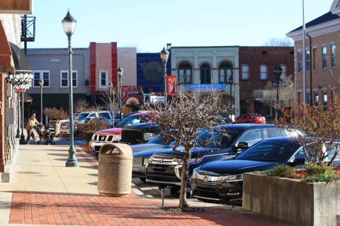 A town's main street of storefronts and sidewalks